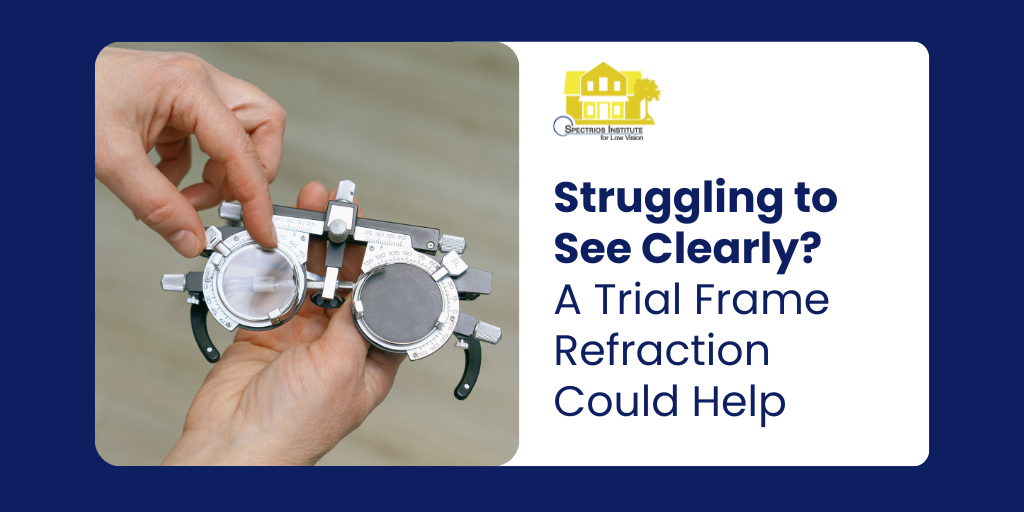 A person holding trial frame refraction eye glasses