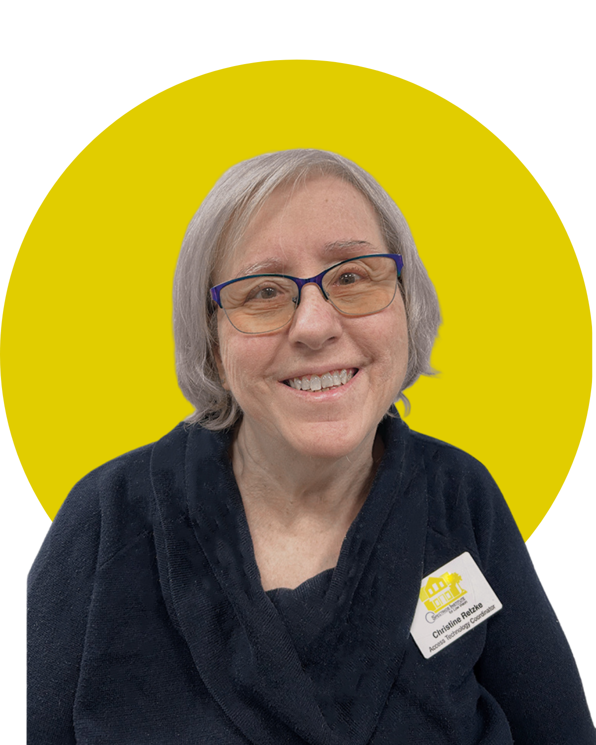 woman with Spectrios name badge, smiling.